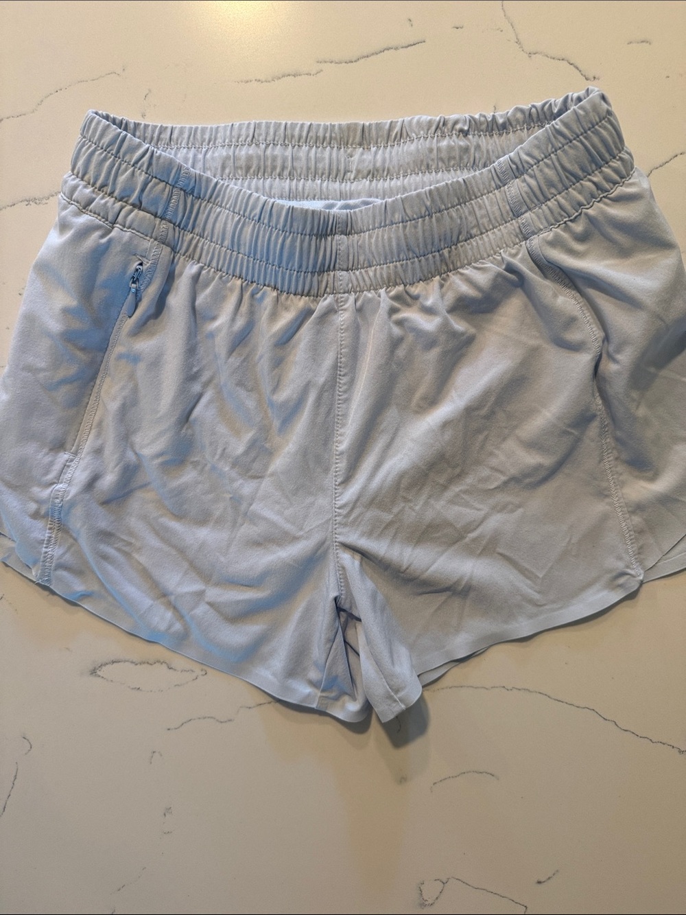 Light Blue Athleta Girls Athletic Shorts in a pretty light blue/gray color